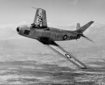North American F-86F Sabre jet, 1953. The F-86F-35-NA had the capability of carrying a nuclear weapon.  The 1200-pound Mk 12 "special store" (as the atomic bomb was euphemistically called) with a yield of up to 12 kT was carried under the port wing, while droptanks were attached under the starboard wing.  The nuclear bomb was delivered by use of the Low Altitude Bombing System (LABS), in which the pilot approached the target at low altitude, pulled up to begin a loop, released the bomb near the top of the loop to throw the bomb away from the flight path, and then escaped the blast by climbing away with an Immelmann turn.  The F-86F-35-NA was equipped with a computer for determining the exact instant of bomb release, along with a set of controls for arming and disarming the "special store" in flight.  Conventional weapons that could be carried included a pair of 1000-pound or smaller bombs, two 750-pound napalm tanks, or eight 5-inch HVAR rockets.  The F-35 was otherwise similar to other F-86Fs.
