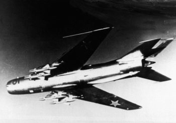A left underside view of a Soviet MiG-19 aircraft.
