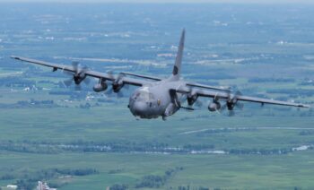 An AC-130J Ghostrider assigned to the 4th Special Operations Squadron, Hurlburt Field, Fla., soars over interior Wisconsin during EAA AirVenture Oshkosh 2021, July 30, 2021. The AC-130J is part of a gunship legacy flight which paid tribute to Air Force Special Operations Command’s heritage and showcased its newest gunship to the public. (U.S. Air Force photo by Master Sgt. Christopher Boitz)